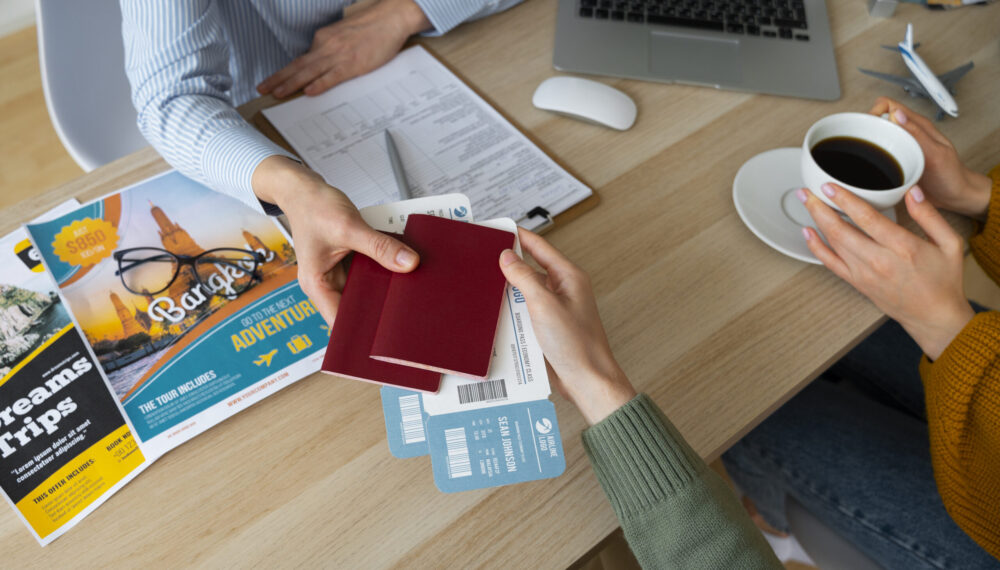 high-angle-woman-working-as-travel-agent